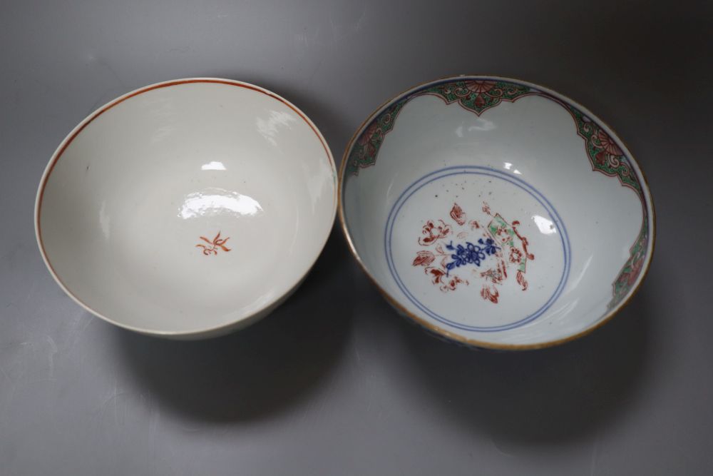 A Chinese Kangxi clobbered bowl and a Chinese Qianlong famille rose bowl